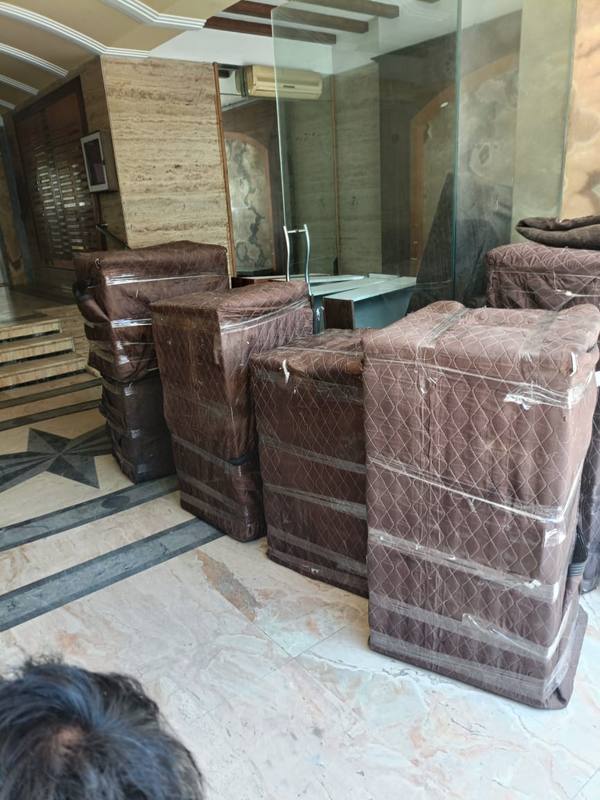 Sofa Set Wrapped with Quilted Blankets – Shiftingeasy Packers and Movers