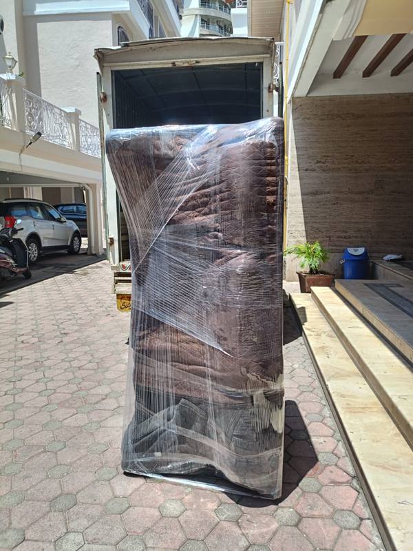 Wardrobe Being Loaded onto Truck – Shiftingeasy Packers and Movers